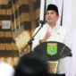  Bupati Tanah Bumbu Andi Rudi Latif saat menyampaikan sambutan dalam sebuah kegiatan Pemkab Tanah Bumbu. (Foto: Prokopim Tanah Bumbu)