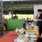 Bupati Fakfak Samaun Dahlan, (Berdiri) saat membuka Musyawarah Perencanaan Pembangunan (Musrenbang) tingkat Distrik Bomberay dan Tomage yang berlangsung di Tomage, Sabtu (19/4/2025), (DETIKINDONESIA/Rri/NicoAfloubun)